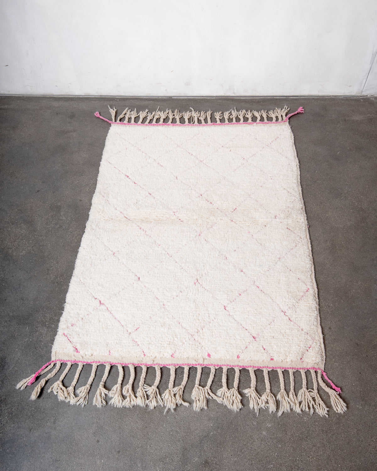 Modern, designer, handcrafted Berber rug from Morocco. Beniourain carpet with beautiful colours and patterns and fluffy wool texture.